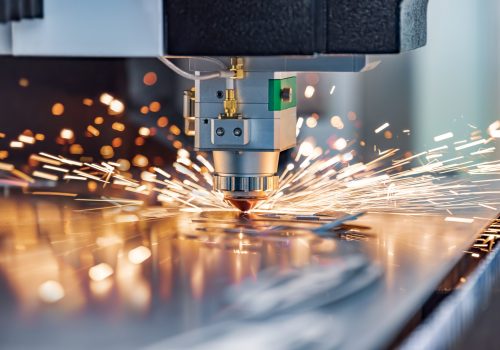CNC Laser cutting of metal, modern industrial technology Making Industrial Details. The laser optics and CNC (computer numerical control) are used to direct the material or the laser beam generated.